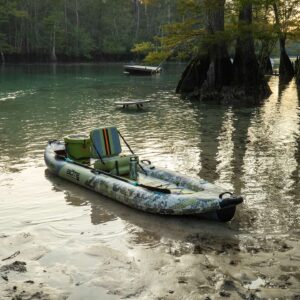 Bote Zeppelin Aero 12'6 Inflatable Kayak in Verge Camo colourway inflatable kayak shown on the water in a paddling lifestyle scene