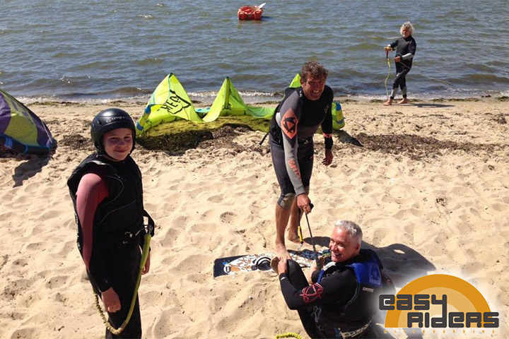 Beginner’s Guide to Kitesurfing: How to Get Started - kitesurfers on the beach