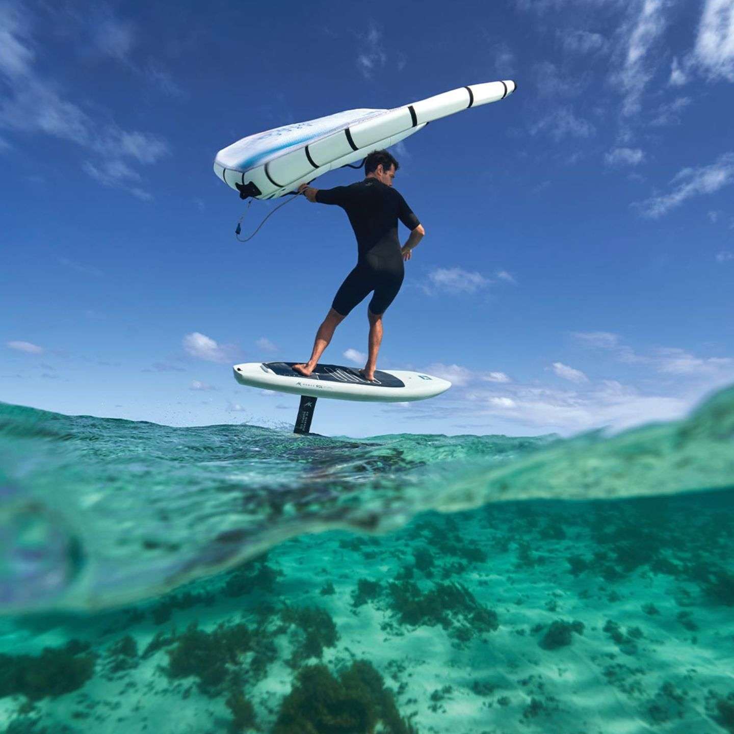 AK Nomad Foil Board 2024 underside view showing the hull shape, tail profile and foil track mounting area