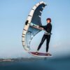 AK Compact v2 Wing Foil Board 2023 deck view showing the EVA traction pad, stance area, rails and nose shape