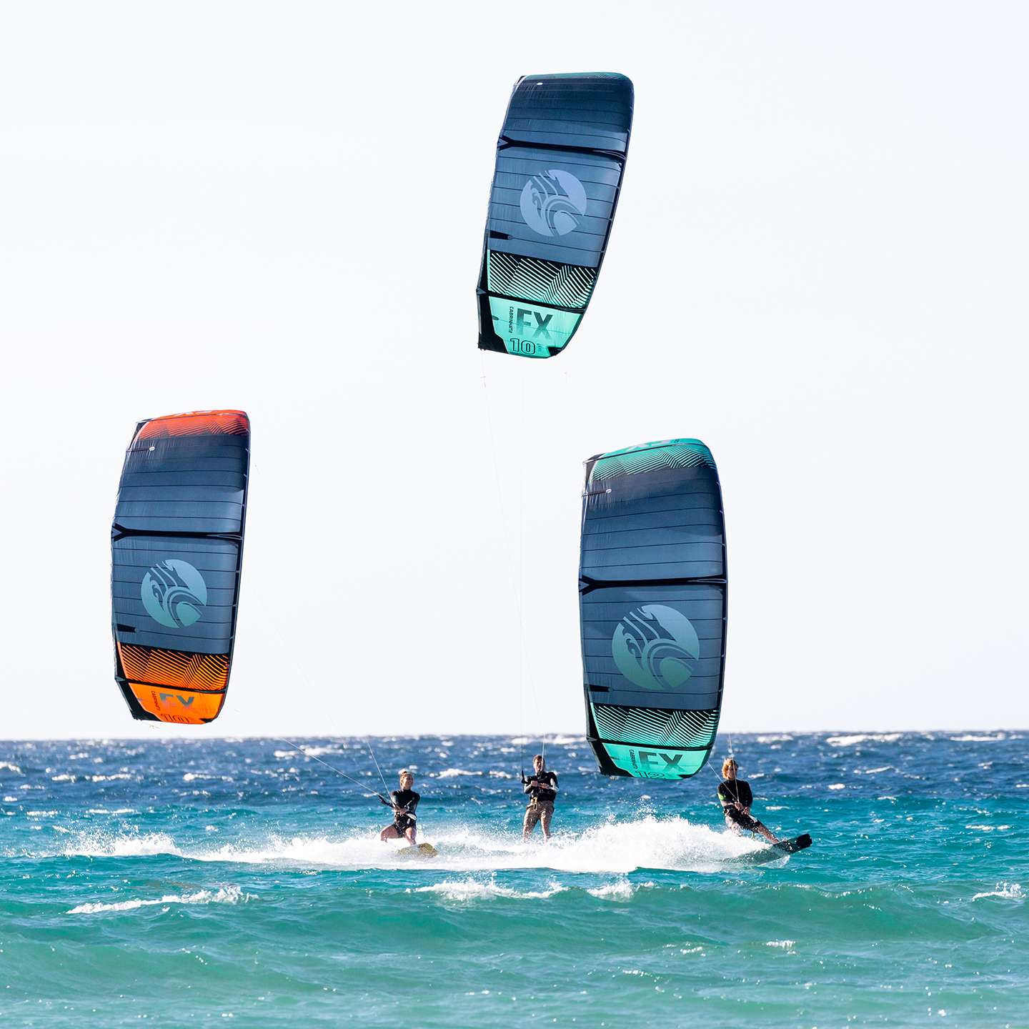 Cabrinha FX 2021 Kite action image with the kite flying above the water, showing canopy shape, stability and on-water kitesurf performance