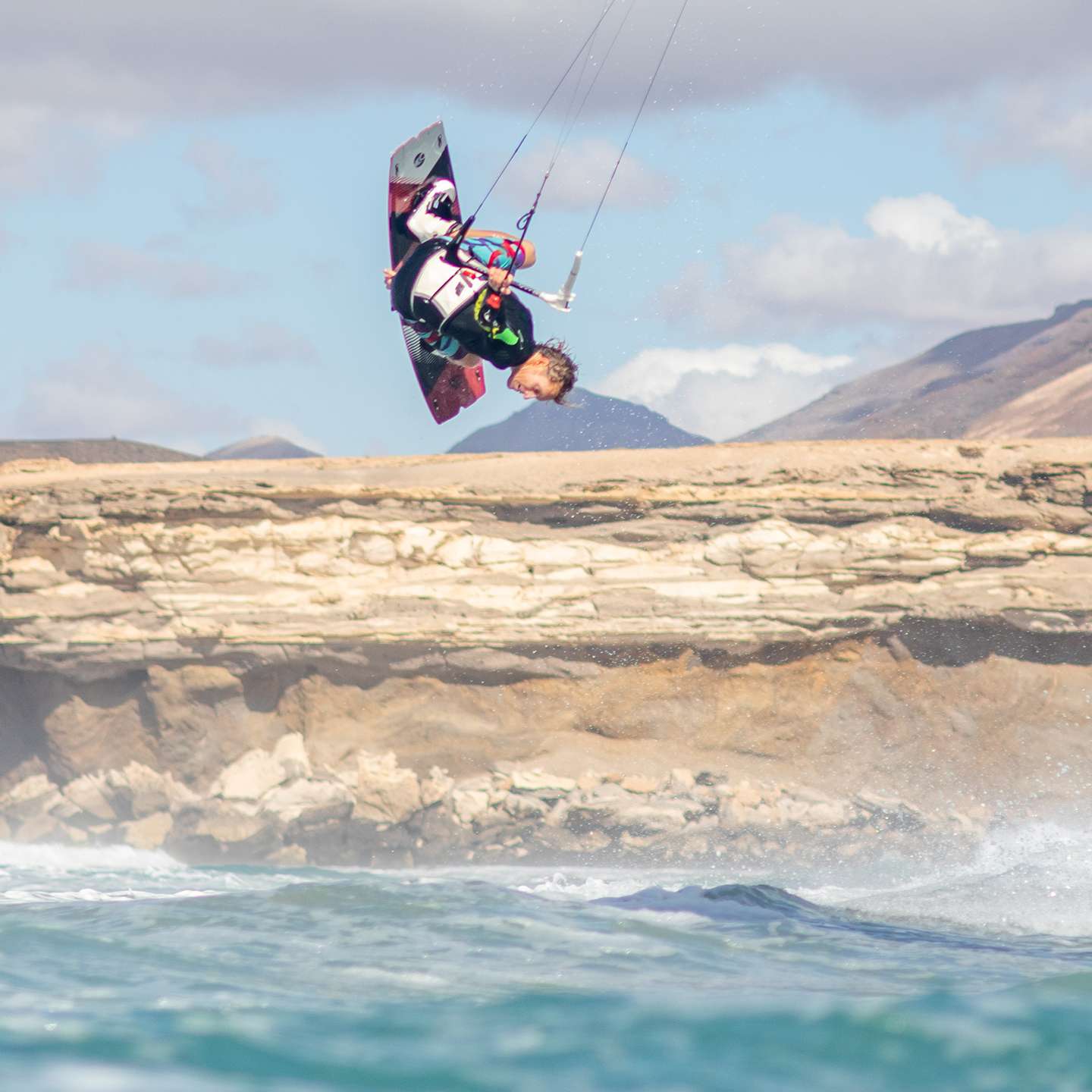 Cabrinha XCaliber Carbon 2021 Kiteboard inflated kite front view showing the full canopy graphics, leading edge curve, strut placement and wingtips