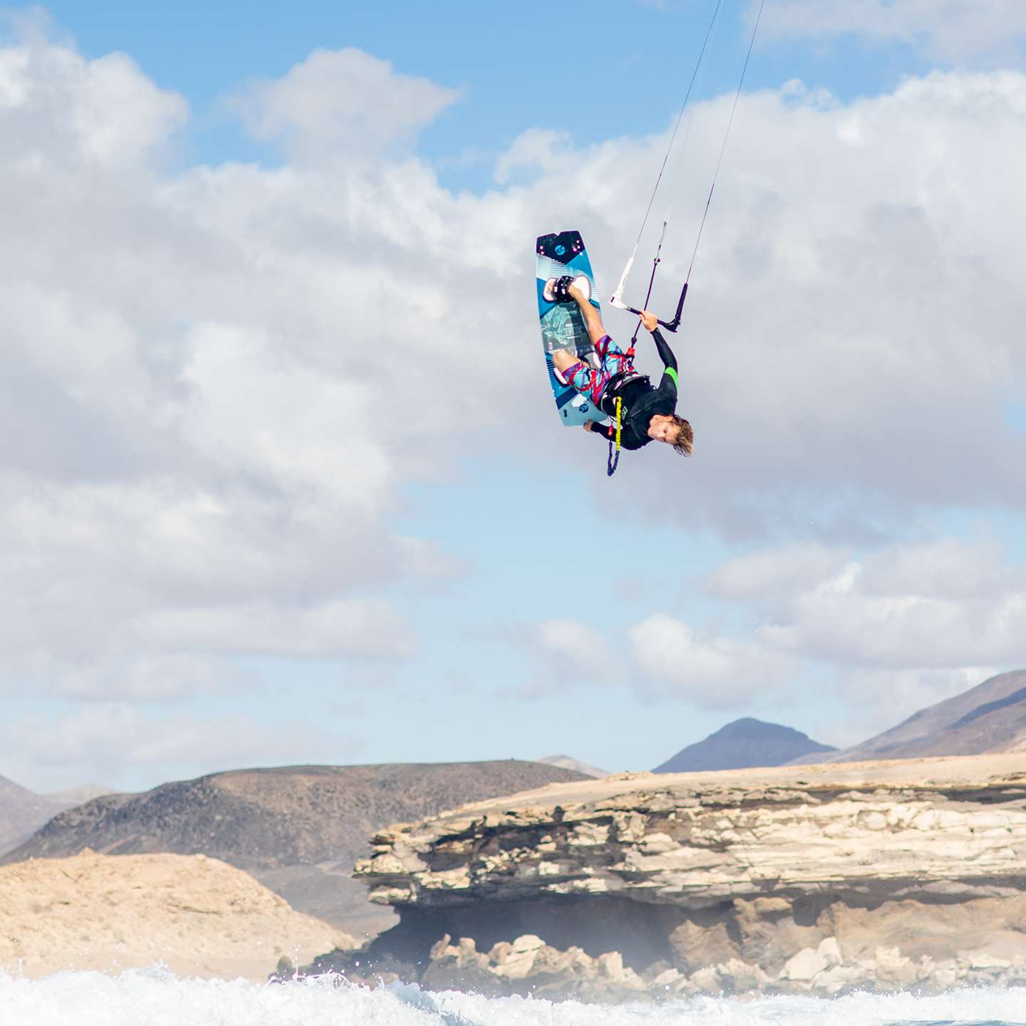 Cabrinha XCaliber Wood 2021 Kiteboard close-up detail of the kite canopy panels, reinforced leading edge, bridle points and stitching construction