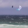 Cabrinha Nitro Apex 2023 Kite profile view showing the inflated kite arc, swept wingtips, strut depth and aerodynamic canopy shape