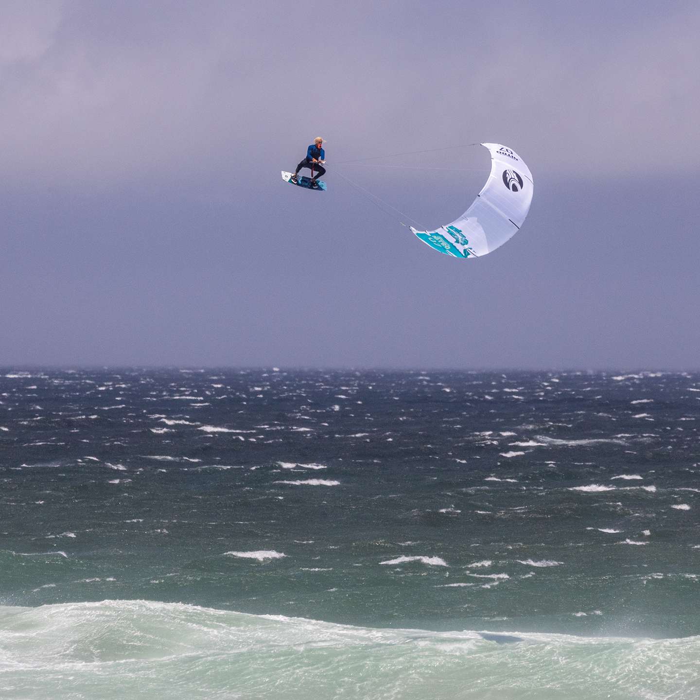 Cabrinha Nitro Apex 2023 Kite profile view showing the inflated kite arc, swept wingtips, strut depth and aerodynamic canopy shape