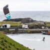 Cabrinha Moto XL Apex 2024 Kite action image with the kite flying above the water, showing canopy shape, stability and on-water kitesurf performance