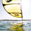 Cabrinha Switchblade 2024 Kite action image with the kite flying above the water, showing canopy shape, stability and on-water kitesurf performance