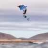 Cabrinha Vision 2025 Wing action image with the wing in use on the water, showing canopy shape, handles and wingfoiling performance