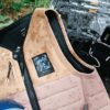 Mystic The Dom FZ Wake Impact Vest 2024 lifestyle view showing vest fit for watersports