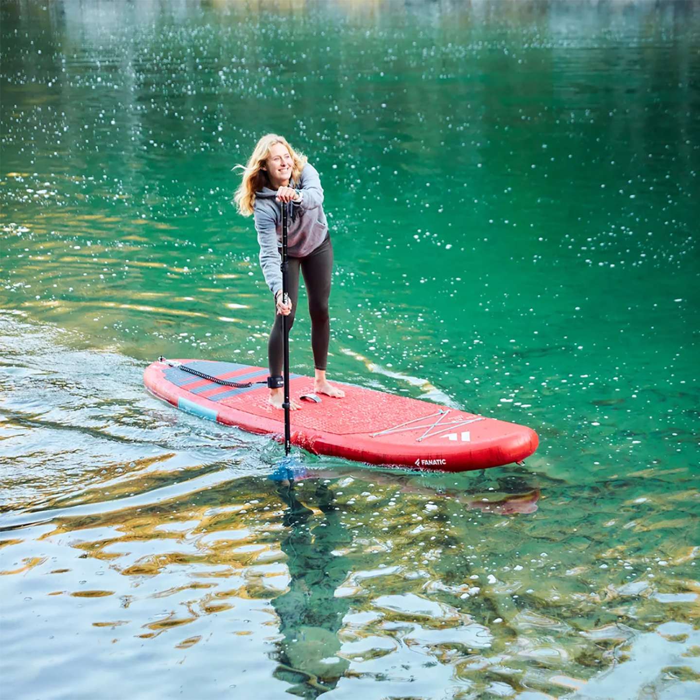 Fanatic Fly Air Red 2023 10'8 Inflatable SUP, deck view showing pad and fittings