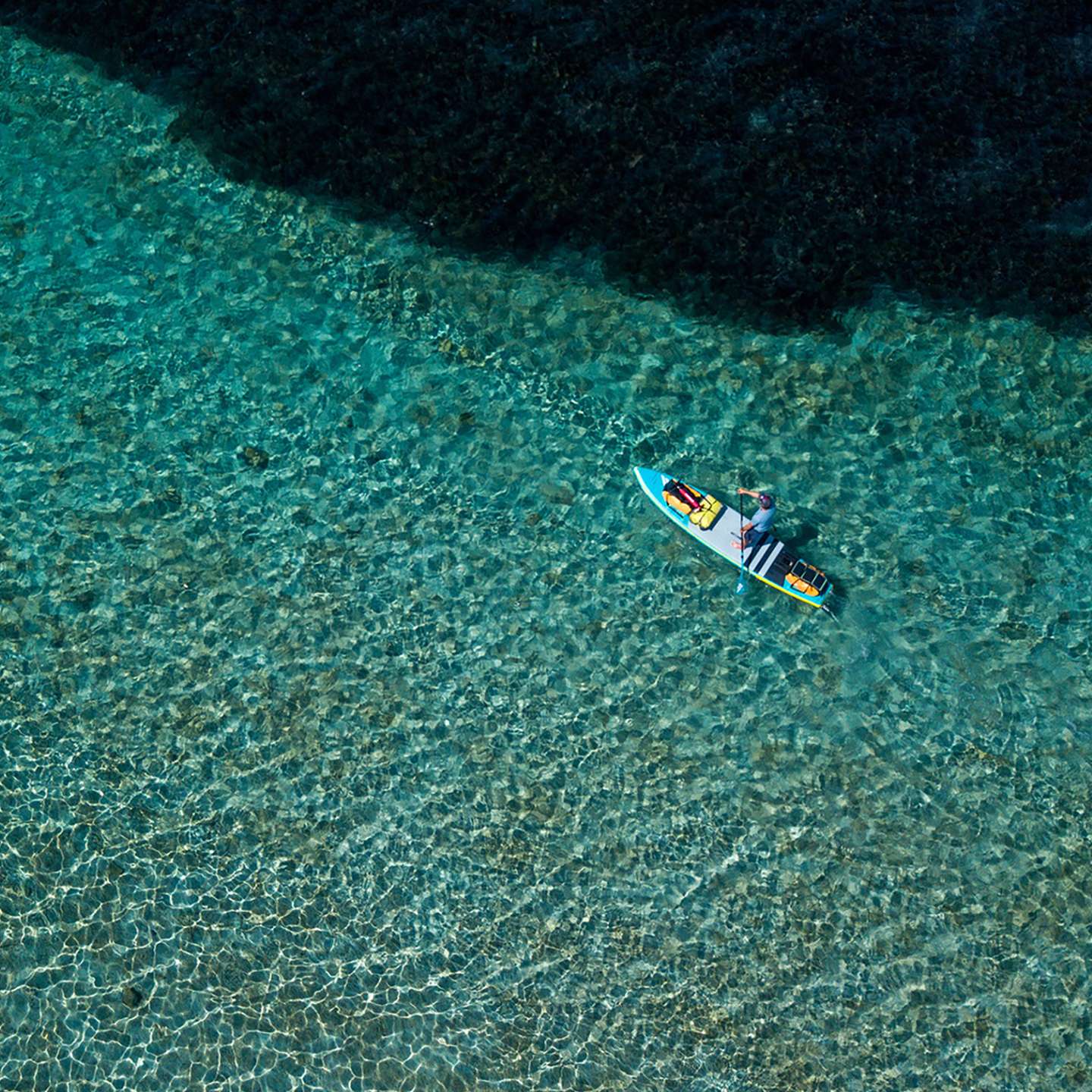 Fanatic Ray Air Premium 2023 13'6 Inflatable SUP with premium construction, deck view showing pad and fittings