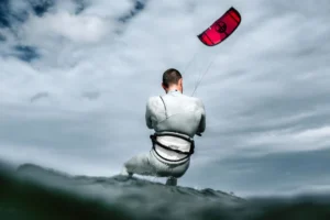 Kitesurfing with a white Mystic kite harness