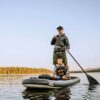 Aquaglide Blackfoot Angler 11'0 Inflatable SUP inflatable SUP lifestyle view showing fishing and paddling use on the water