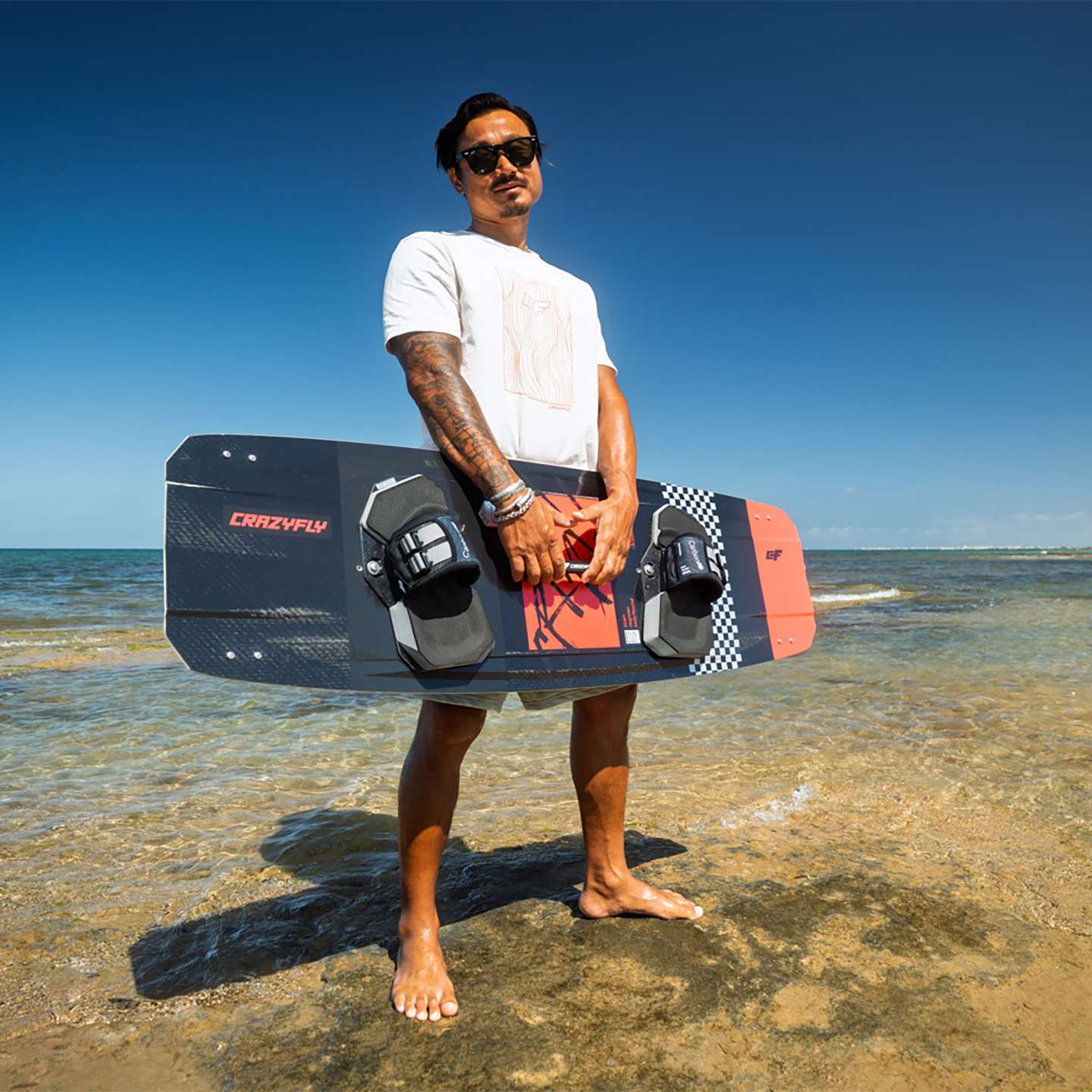 Crazyfly Raptor Extreme 2026 Kiteboard base view showing the underside graphics and board shape