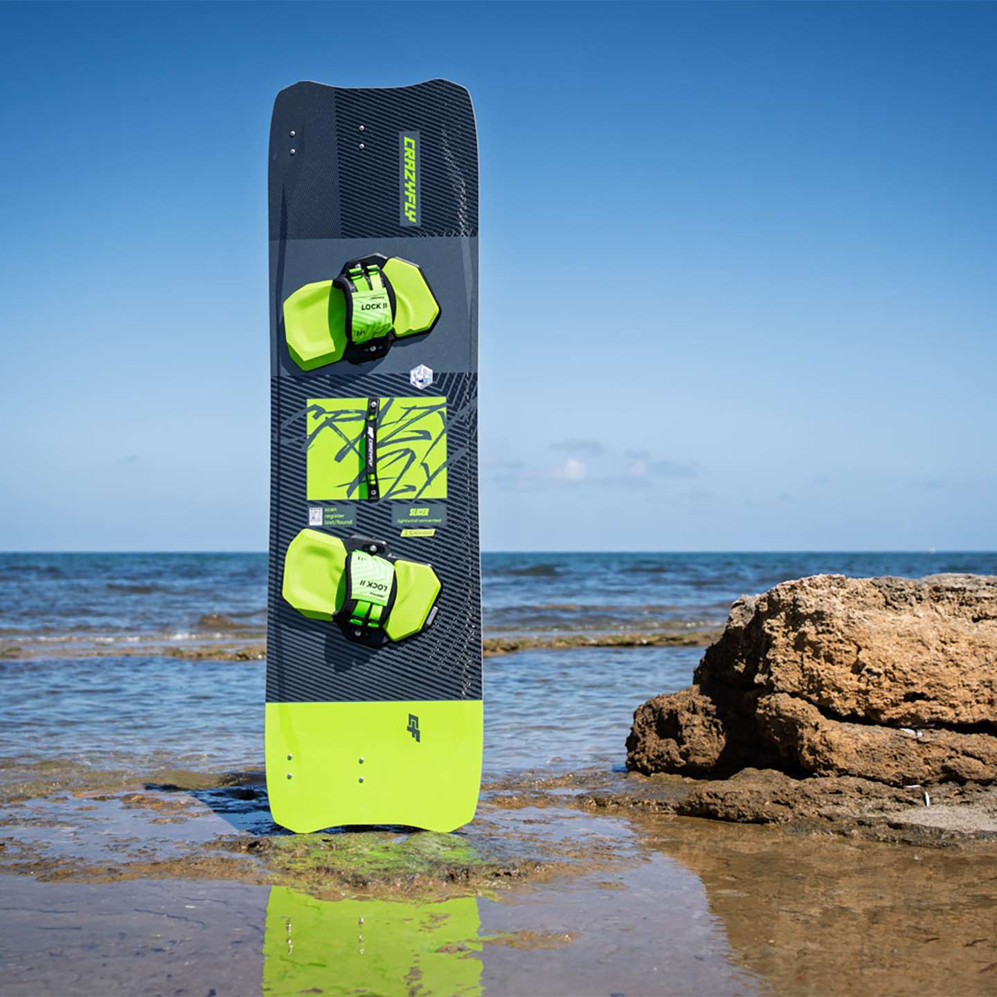 Crazyfly Slicer 2026 Kiteboard base view showing the underside graphics and board shape