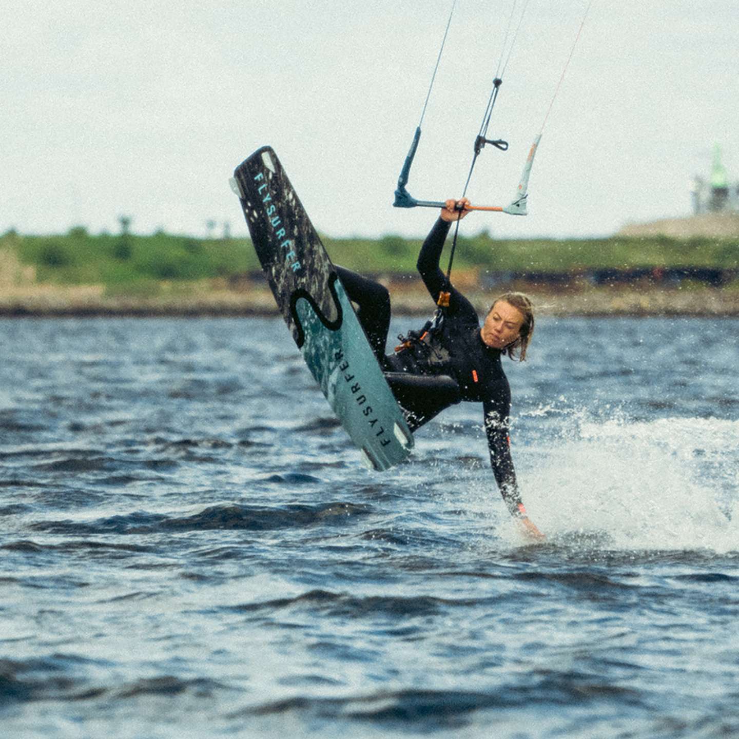 Flysurfer Trip 2 Kitesurf Board, deck view showing the pad, straps and outline