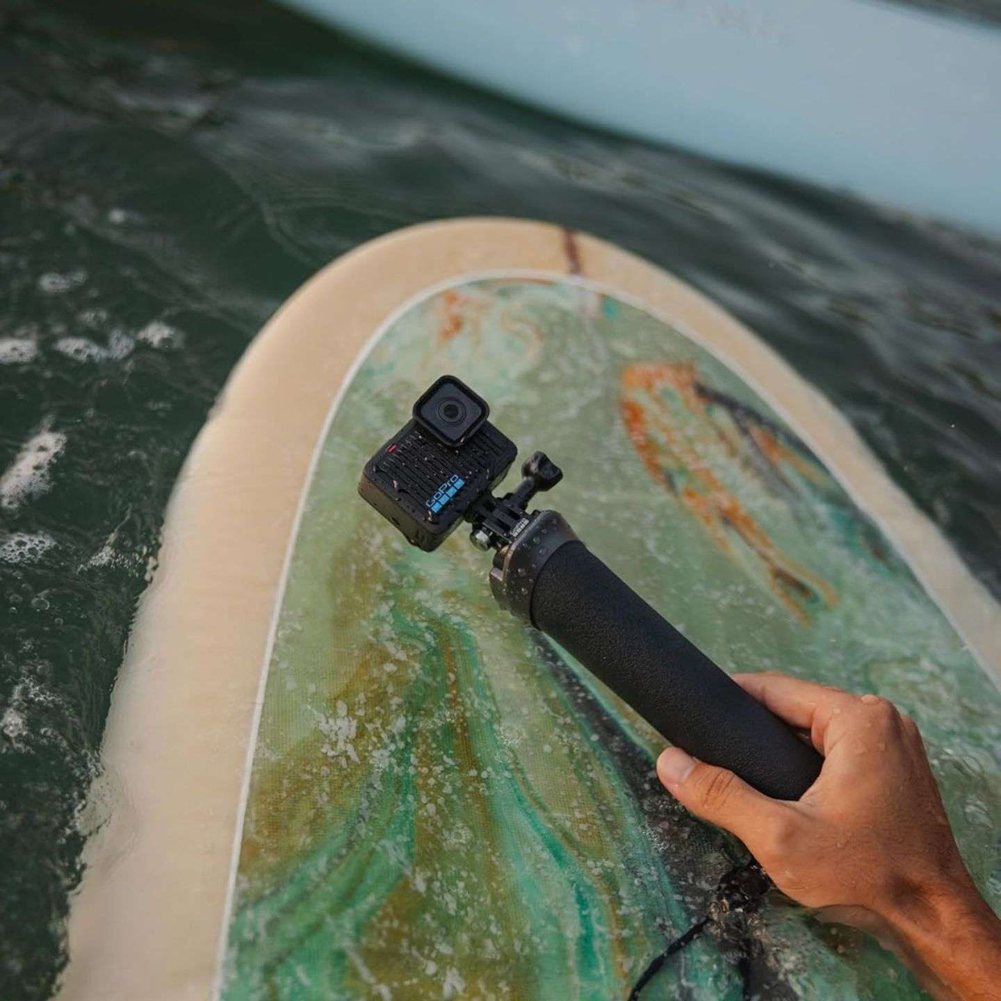 GoPro HERO package accessory detail for mounting and charging