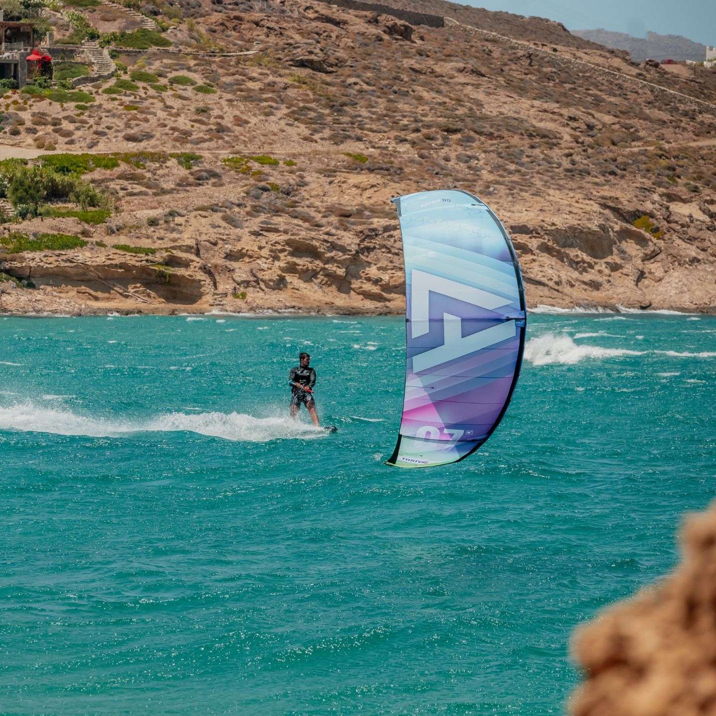 Harlem Thrive Kite, on-water kitesurfing action and lifestyle view