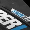 Hyperlite State 2.0 2026 Wakeboard – detail view highlighting the wakeboard base, channels and fin area