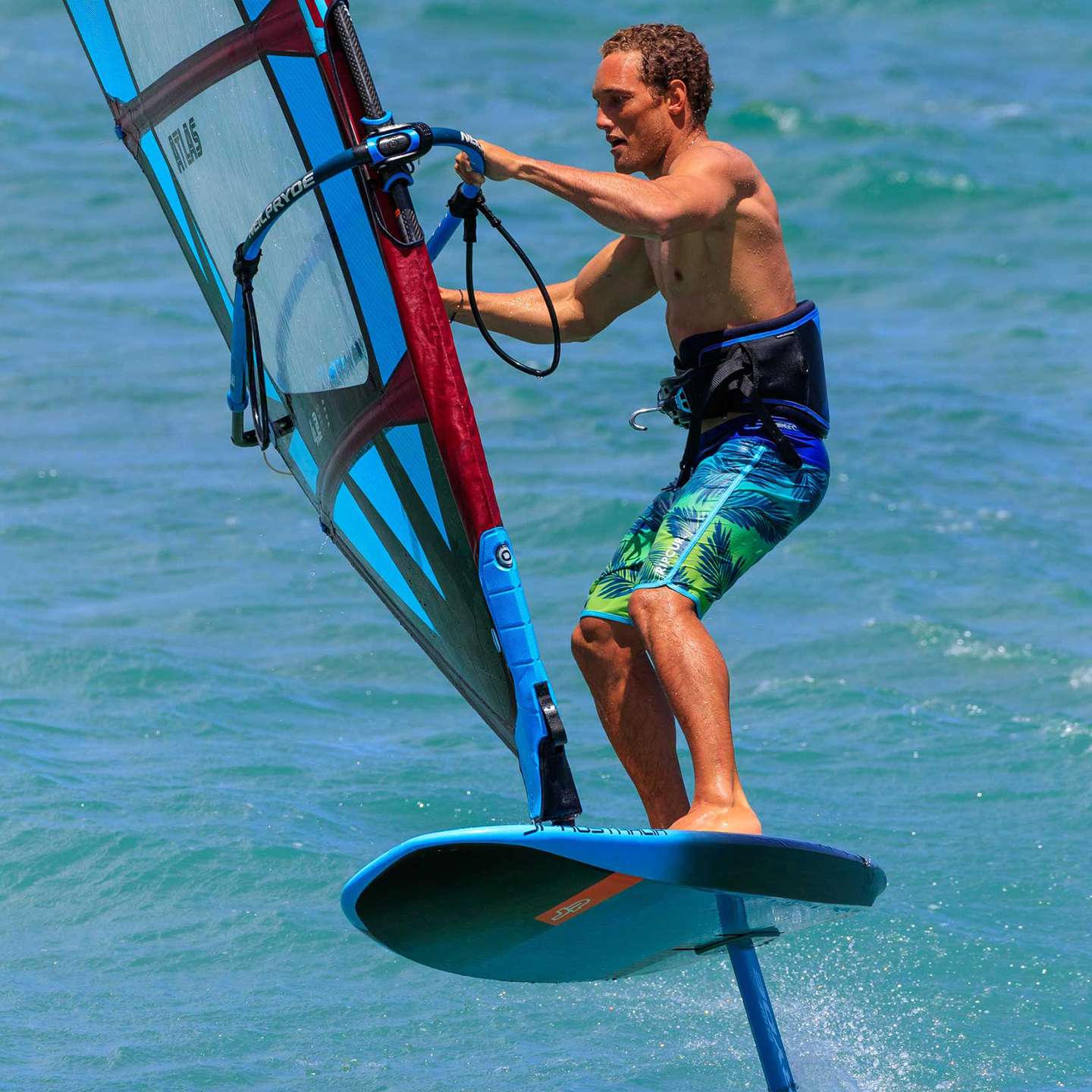 JP Foil Surf Foil Board 2020 action view on the water showing the foil board lifting and gliding above the surface