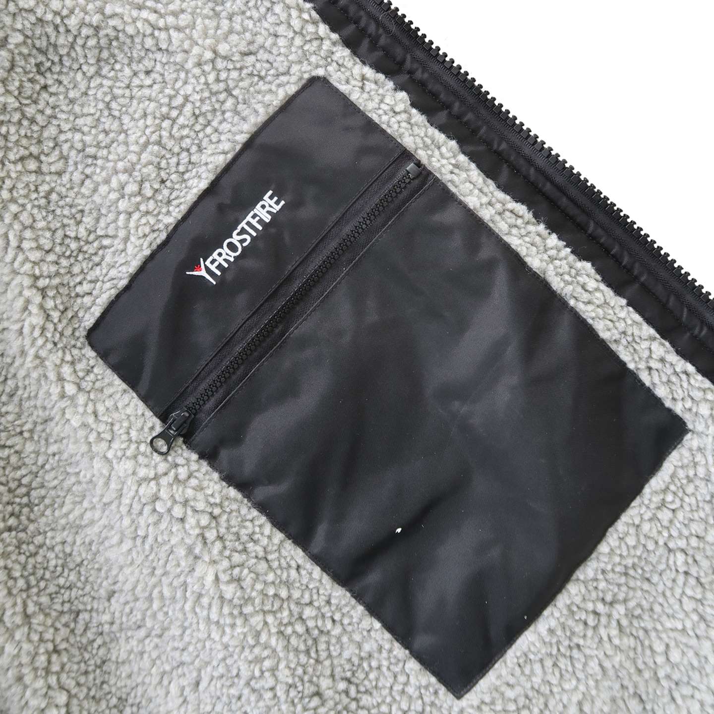 Moonwrap Long Sleeve Waterproof Changing Robe close-up detail of robe fabric, cuffs and outdoor changing features