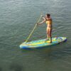 O'Shea 10'2 QSx Pink Inflatable SUP 2025 deck view showing traction pad, carry handle and board shape