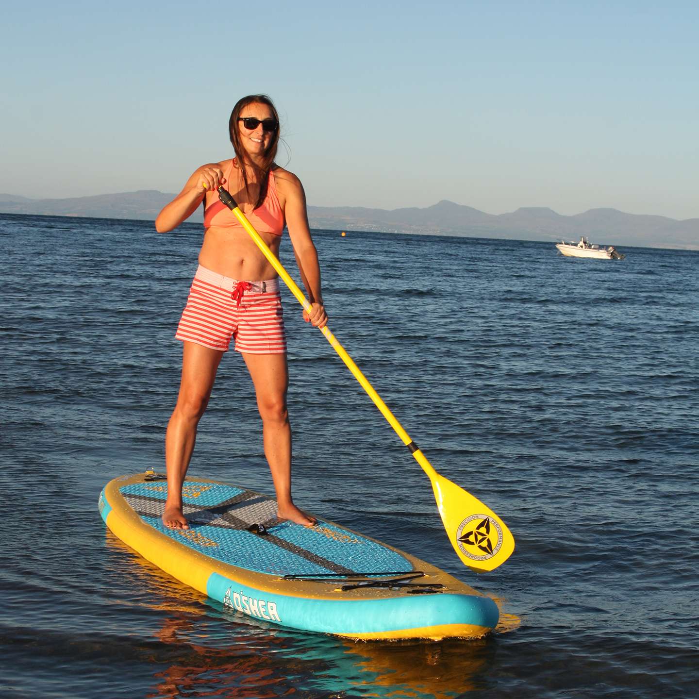 O'Shea 10'8 HDx Inflatable SUP 2025 deck view showing traction pad, carry handle and board shape