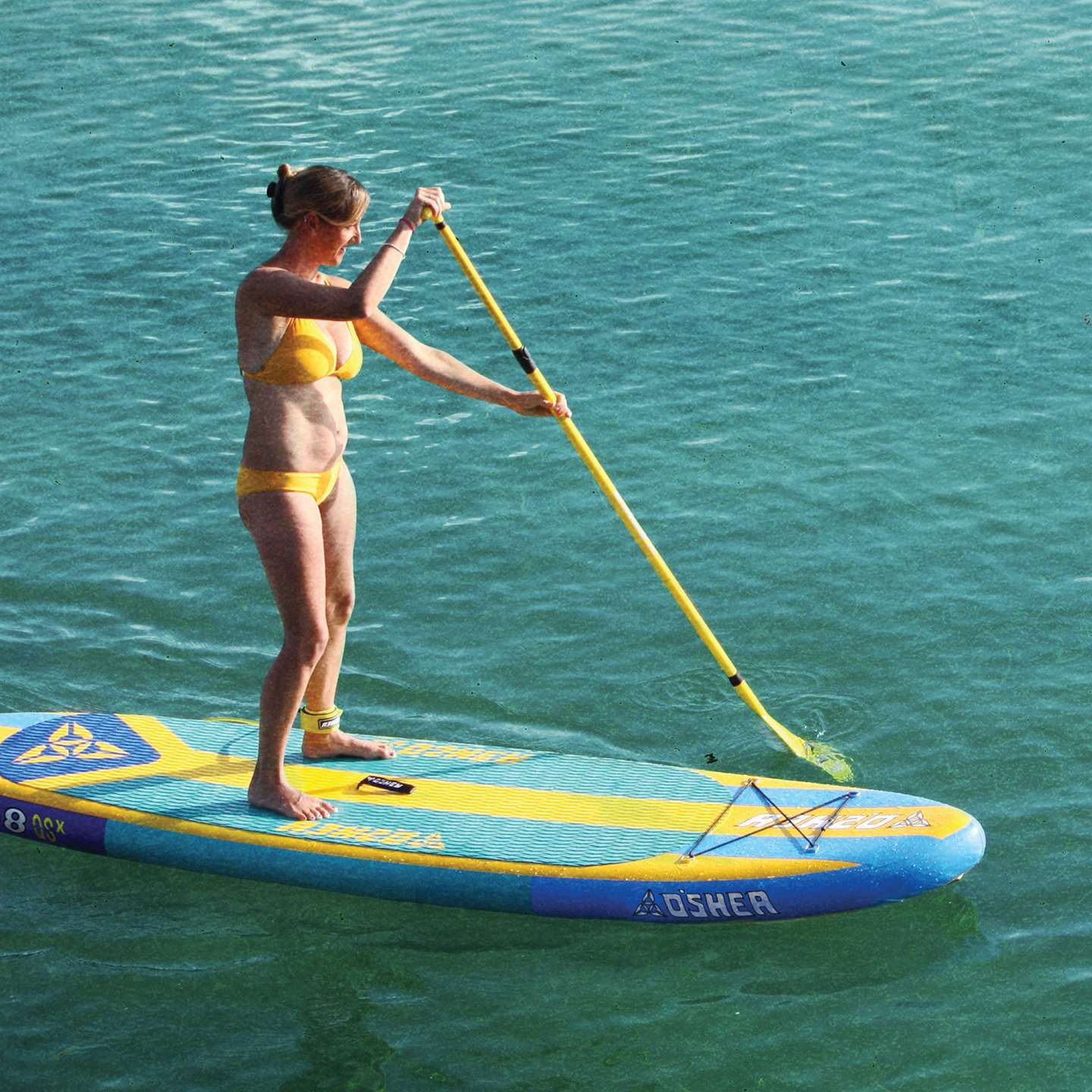 O'Shea 10'8 QSx Inflatable SUP 2025 deck view showing traction pad, carry handle and board shape
