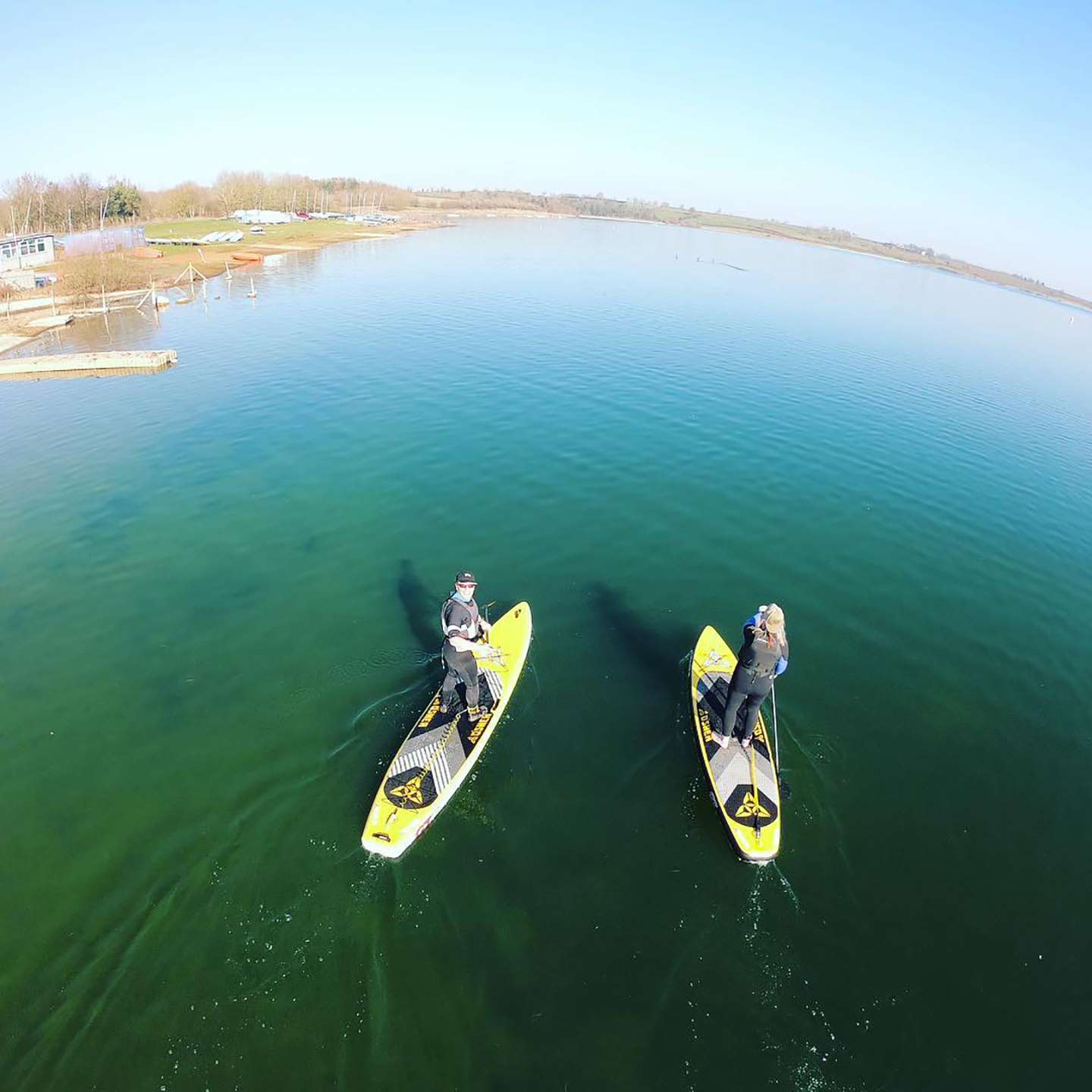 O'Shea 11'2 GT HDx Inflatable SUP 2023 deck view showing traction pad, carry handle and board shape