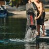 Ronix District 2026 Wakeboard lifestyle-style gallery image showing the wakeboard design