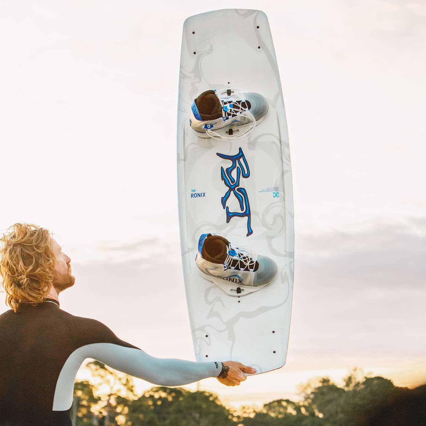 Ronix RXT Blackout 2026 Wakeboard in blackout lifestyle-style gallery image showing the wakeboard design