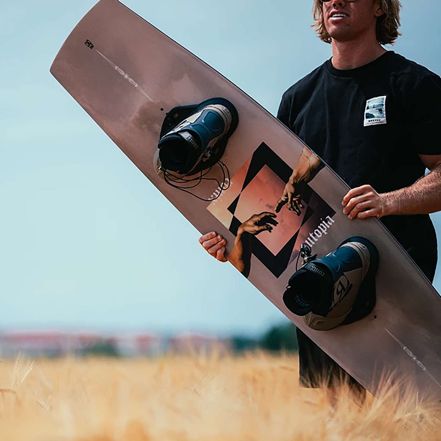 Ronix Utopia Variable Flex 2026 Wakeboard lifestyle-style gallery image showing the wakeboard design