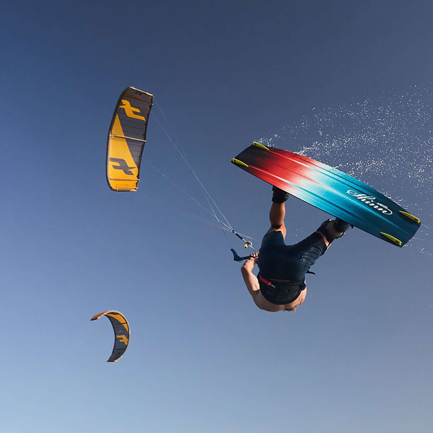 Shinn ADHD Prismatic Kiteboard 2023 top deck view showing the board graphic, outline and stance area