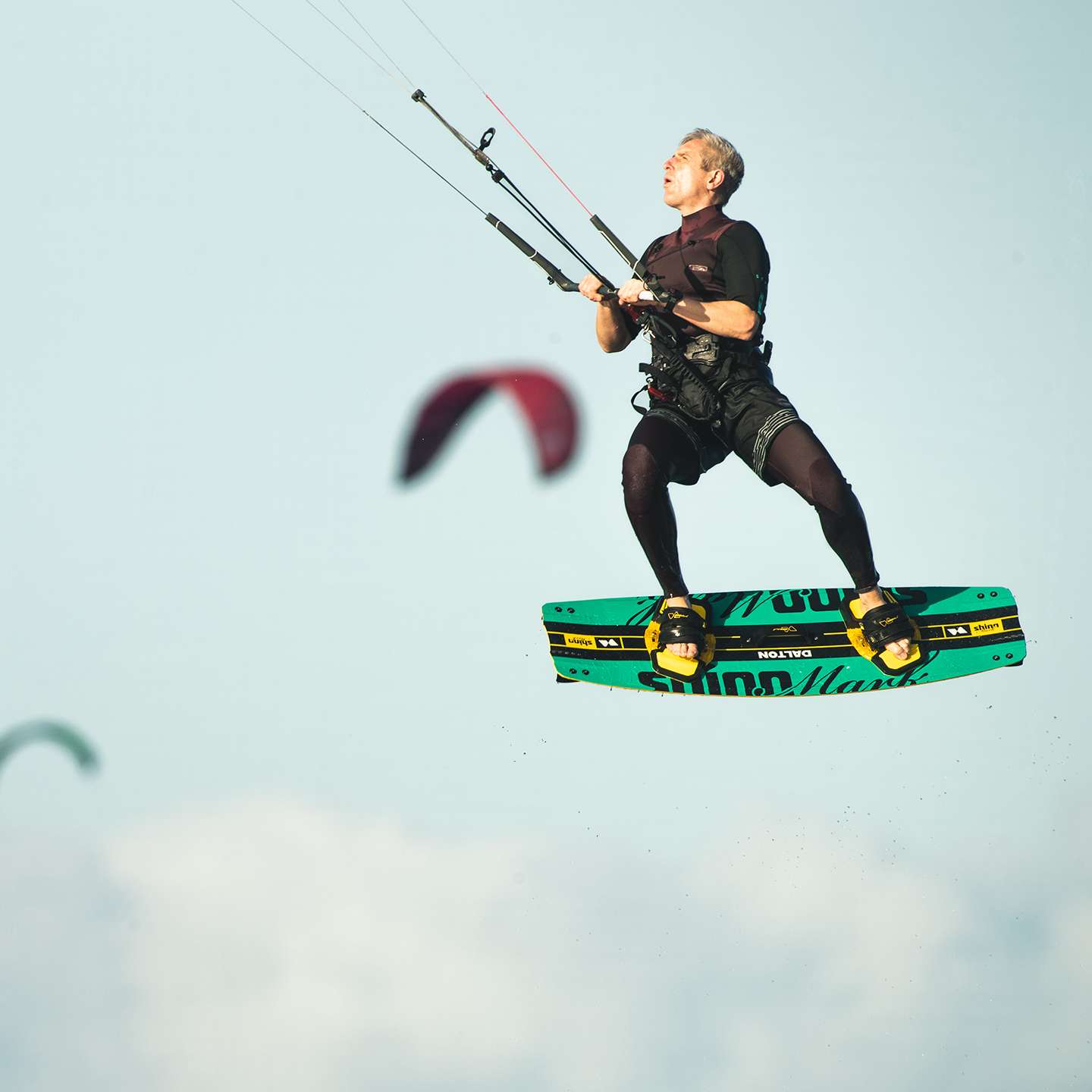 Shinn Dalton Kiteboard 2025 top deck view showing the board graphic, outline and stance area