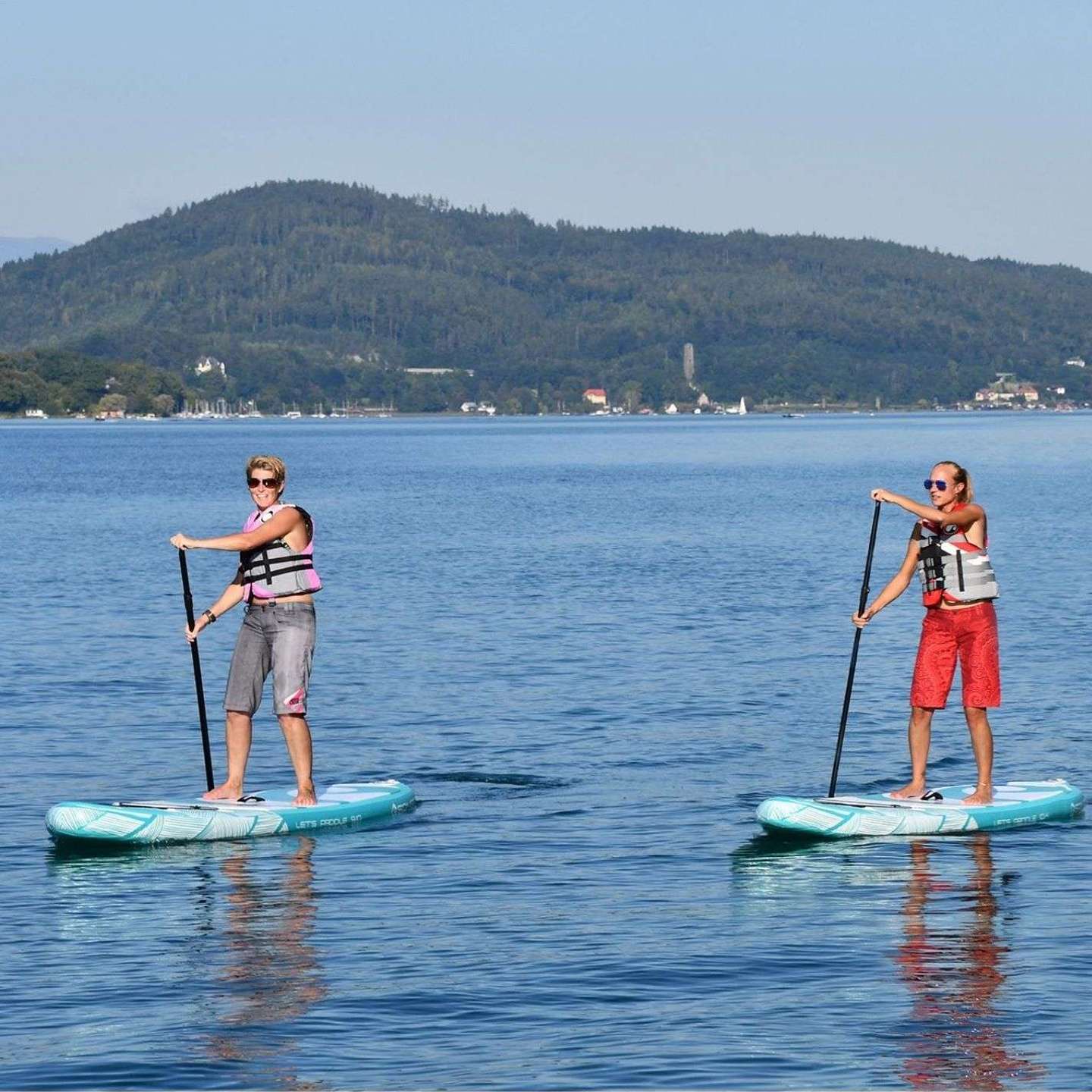 Spinera Lets Paddle 11'2 Inflatable SUP Package inflatable stand up paddle board underside view highlighting the hull shape, fin area and inflatable board profile