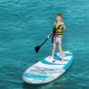 Spinera Lets Paddle 9'10 Inflatable SUP Package inflatable stand up paddle board lifestyle view of the inflatable paddle board set up for flat-water paddling