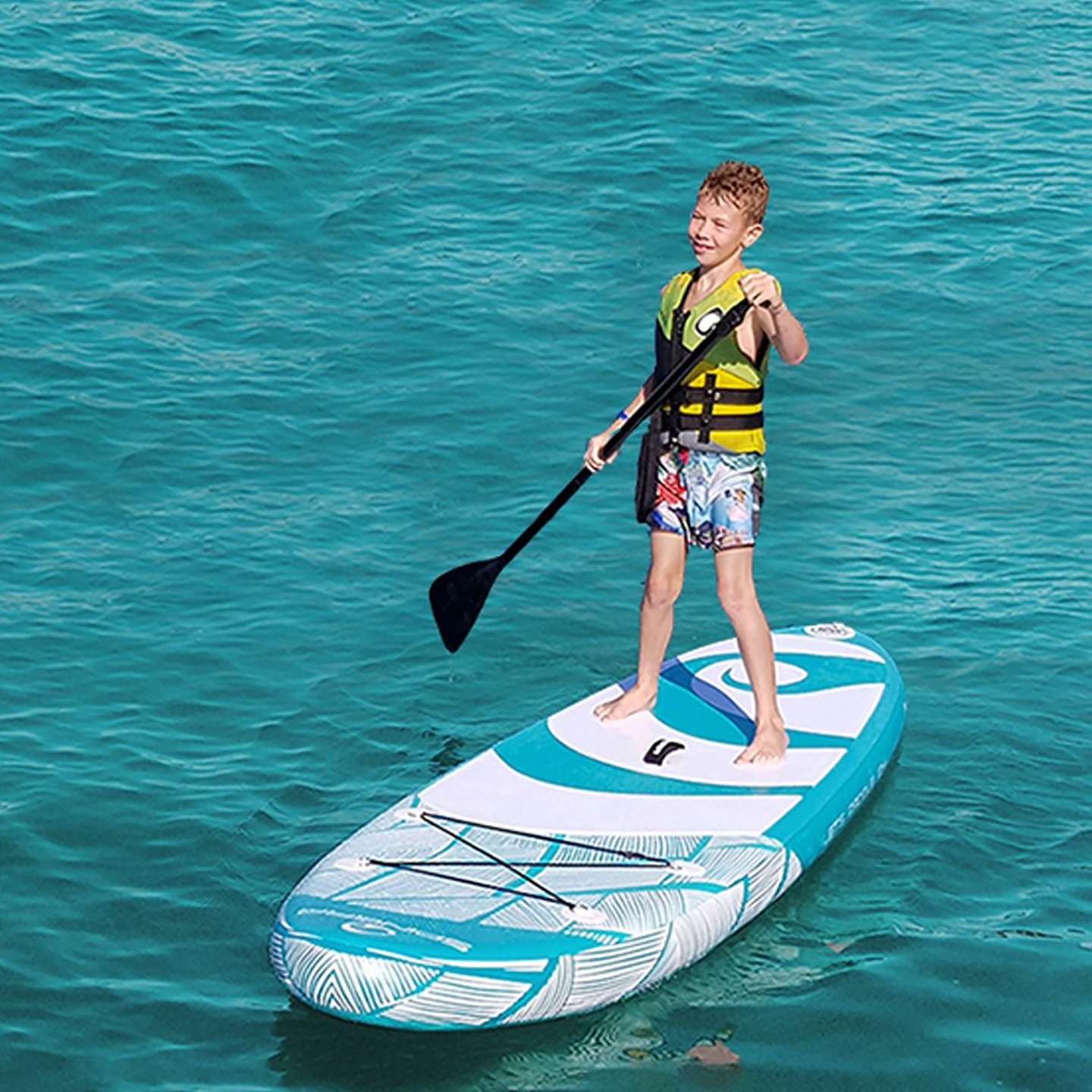 Spinera Lets Paddle 9'10 Inflatable SUP Package inflatable stand up paddle board lifestyle view of the inflatable paddle board set up for flat-water paddling