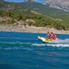 spinera-rocket-3-tube-alt1-zoom Spinera Rocket 3 Inflatable Watersled inflatable towable water tube lifestyle view of the towable tube inflated and ready for use behind a boat