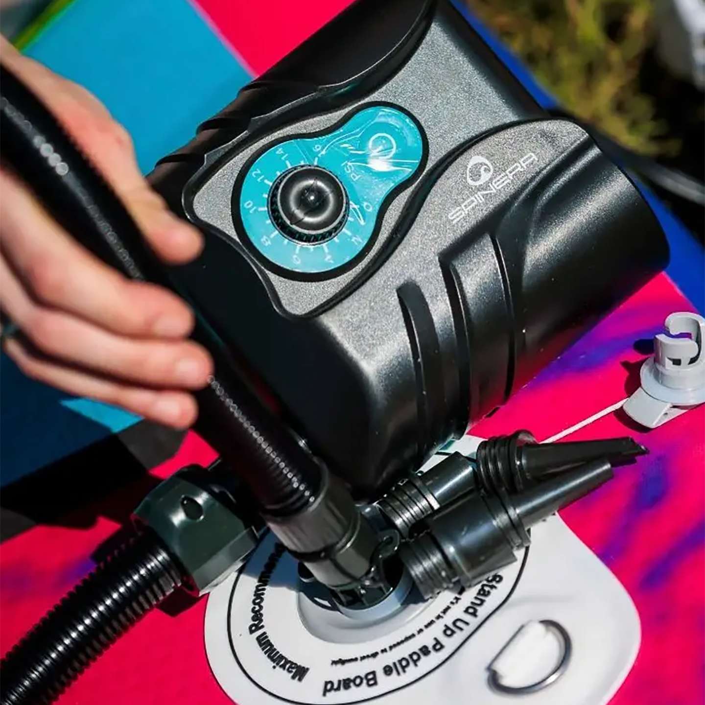 spinera-sup1-electric-sup-pump-alt1-zoom Spinera SUP1 12V Electric SUP Pump 12V electric SUP pump alternate view showing the digital controls, hose connection and 12V power lead