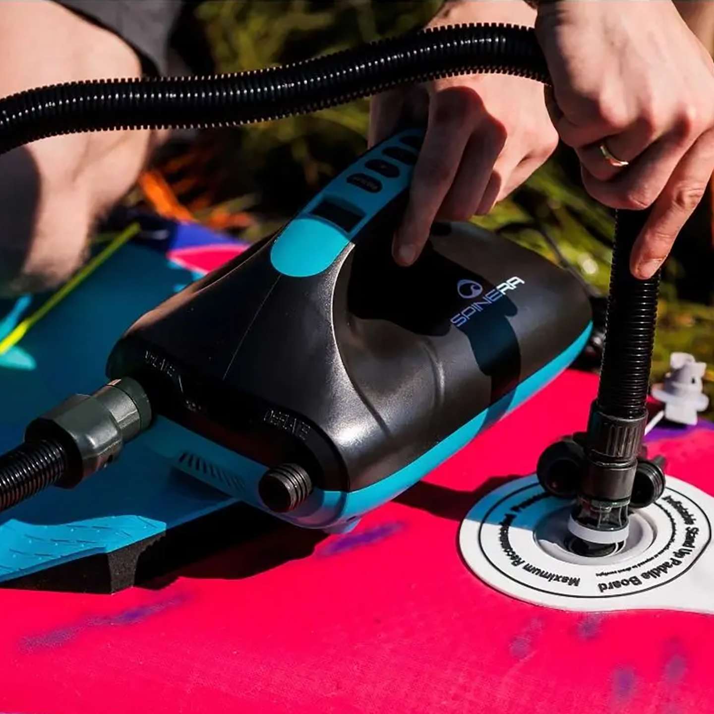 Spinera SUP3 12V Electric SUP Pump 12V electric SUP pump alternate view showing the digital controls, hose connection and 12V power lead