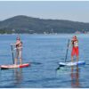 Spinera SUPVENTURE DLT iSUP inflatable stand up paddle board lifestyle view of the inflatable paddle board set up for flat-water paddling