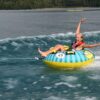 Spinera Wild Bob Inflatable Tube inflatable towable water tube on-water style image highlighting the handles, seating area and inflatable deck shape