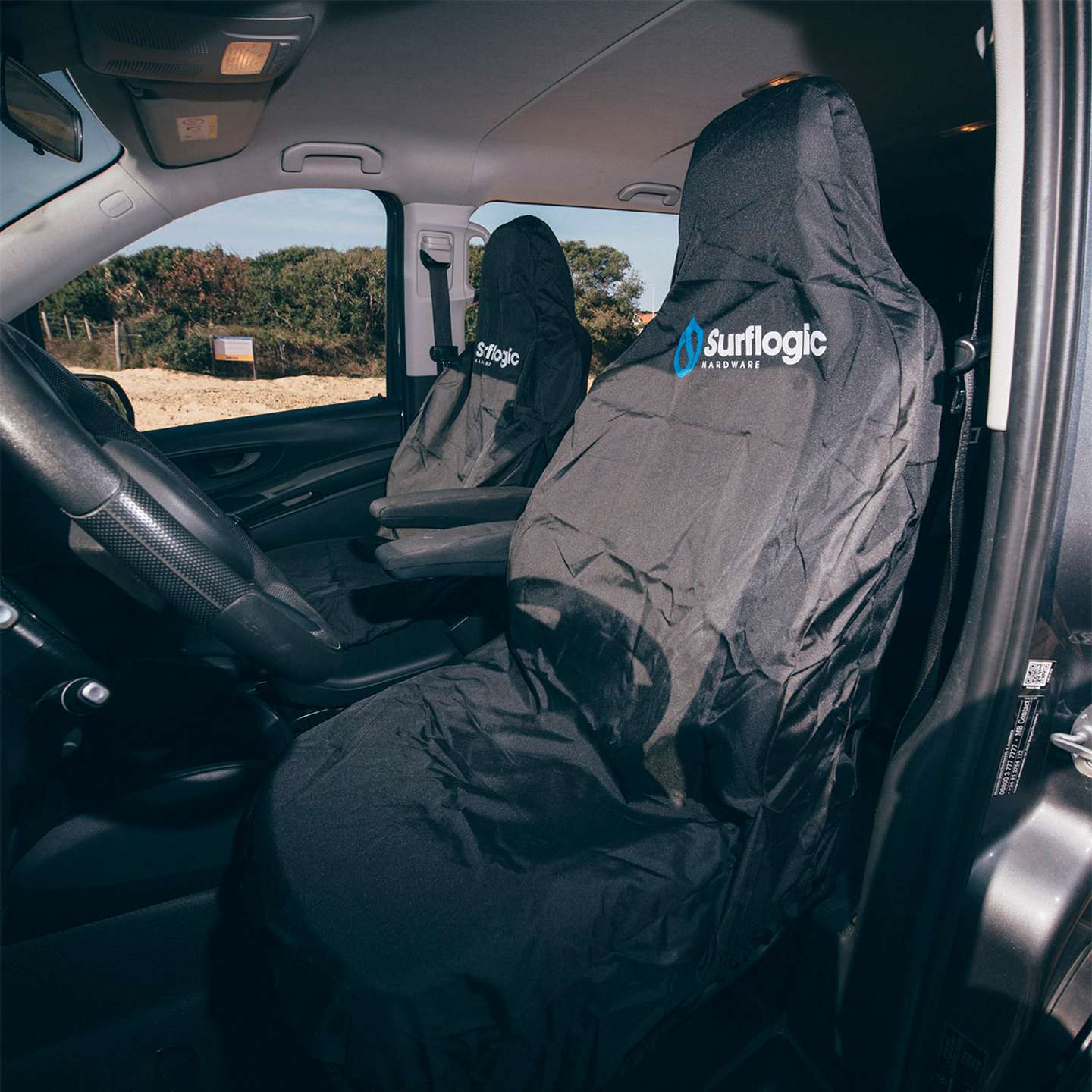 Surflogic Waterproof Car Seat Cover Single in black fitted on vehicle seat lifestyle view