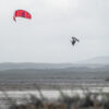 Cabrinha Nitro Apex 2026 Kite action image with the kite flying above the water, showing canopy shape, stability and on-water kitesurf performance