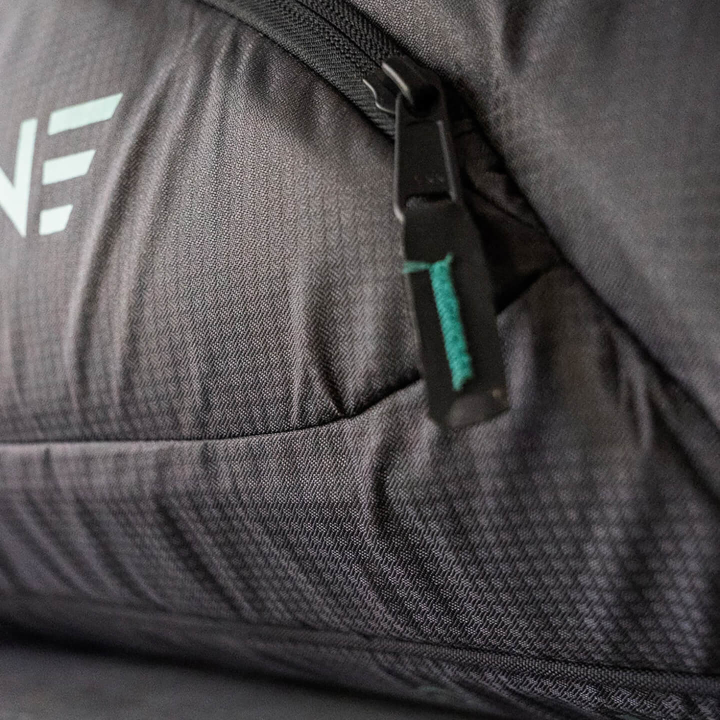 Ride Engine RE_Serve Golf Coffin Bag travel feature detail showing padded travel protection and storage features