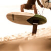 Cabrinha Code Wing Foil Board 2025 base view showing underside graphics, channels, rocker line, rail shape and bottom construction details