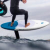 Cabrinha Swift Foil Board 2025 base view showing underside graphics, channels, rocker line, rail shape and bottom construction details