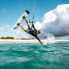 Cabrinha Stylus 2026 Kiteboard profile view showing the inflated kite arc, swept wingtips, strut depth and aerodynamic canopy shape