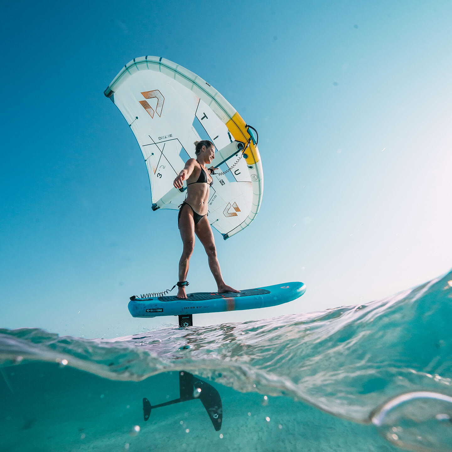 Duotone Sky Air Inflatable Foil Board 2026 on-water foil boarding action photo