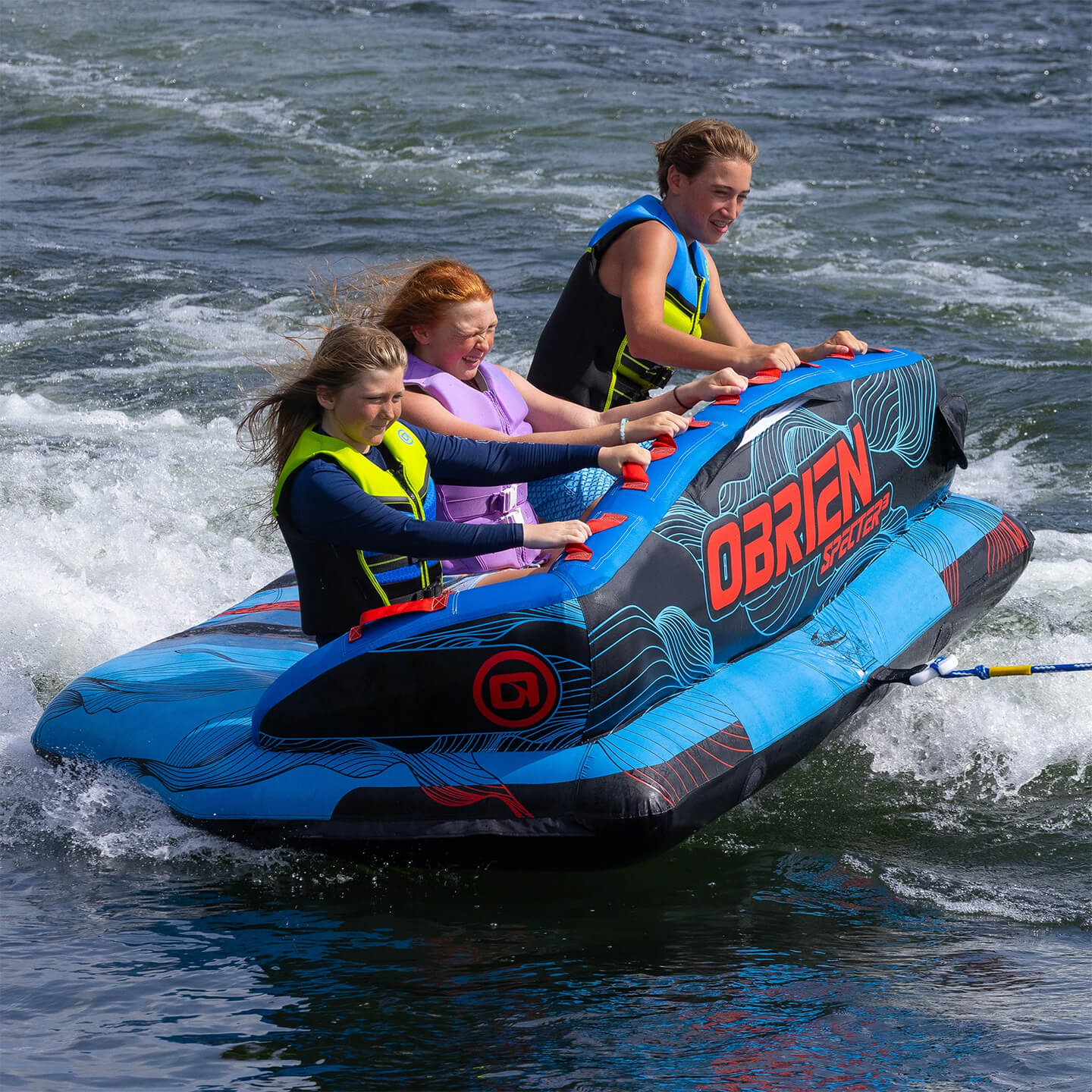 obrienspecter3tubealt4 O'Brien Specter 3 Inflatable Tube towable tube action image showing riders being towed on the water